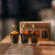 Three small gift set size rums with box in background